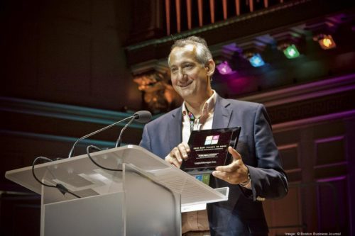 LogicManager accepts the award for the Boston Business Journal's Best Places to Work in 2016